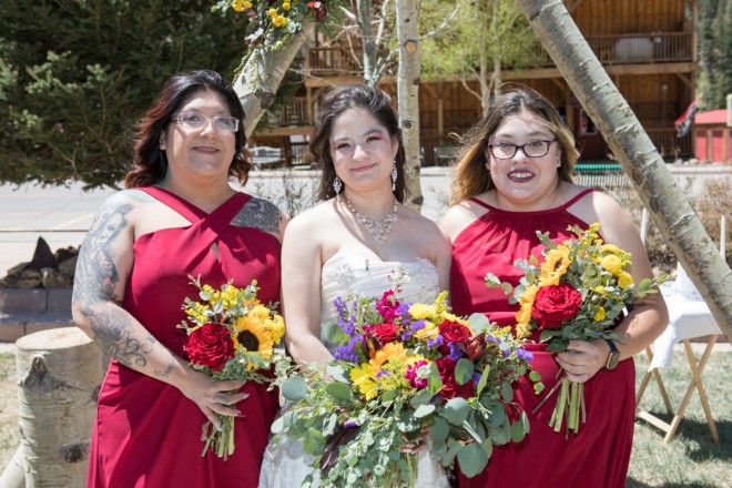 Red River, NM bride with her maid and maitron of honor