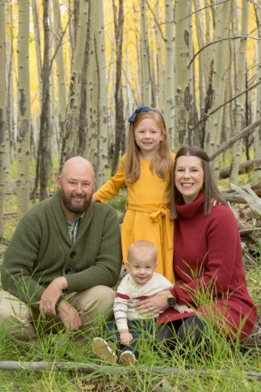 Family portrait in forest with children