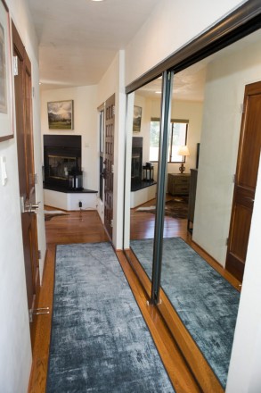 Hallway from living to master bedroom at Quail Ridge of Taos condo