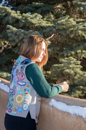 Senior photos of Girl Scout at golden hour in Taos, NM.