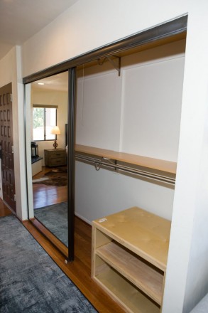 Giant closets for storage in hallway at small skier rental in Taos, NM