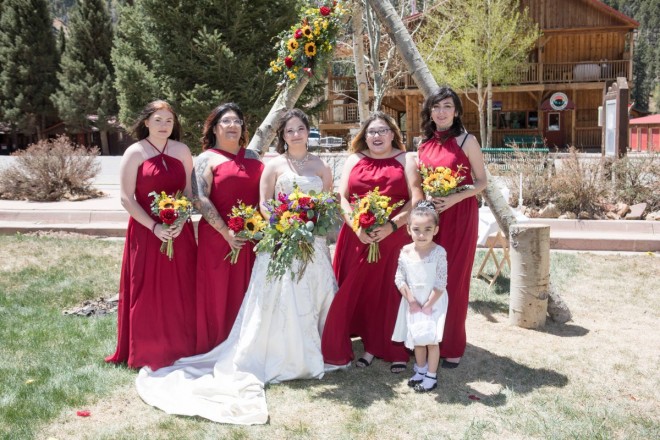 Bridesmaids in red at this Red River springtime wedding