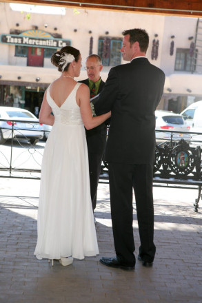 Bride and groom are married by Dan Jones under the Taos gazebo