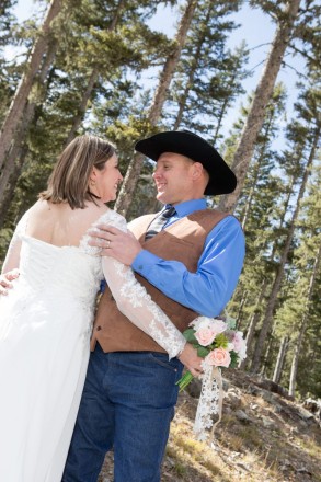 Ponderosa pines and sunshine at outdoor elopement ceremony at Taos Ski Valley
