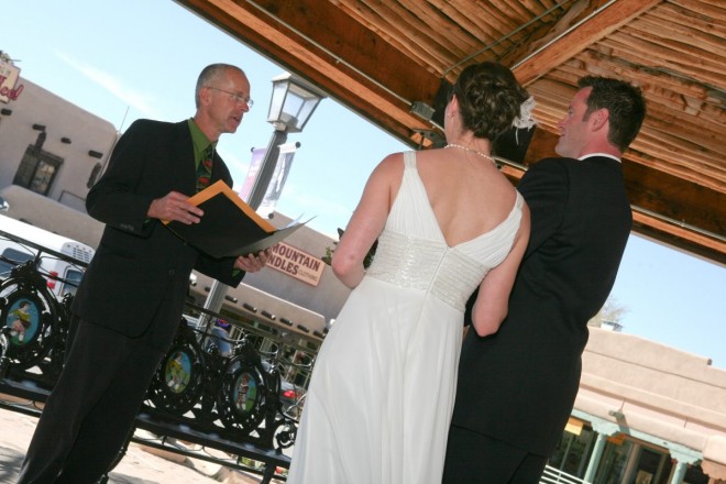 Dan Jones officiates a wedding under the gazebo in Taos plaza