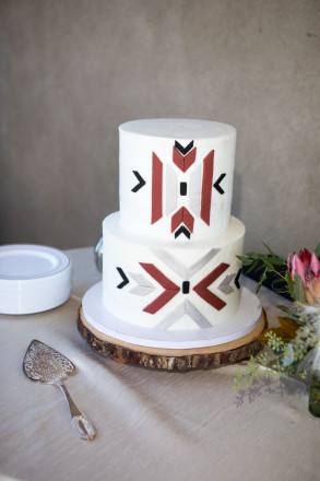 Chasity and Bill have a wedding cake with a perfect New Mexico southwest design