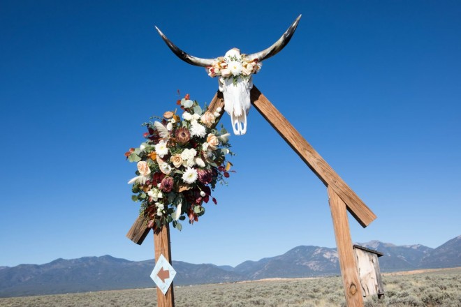 The altar was traditional and contemporary with the Taos mountains, sagebrush, and flowers