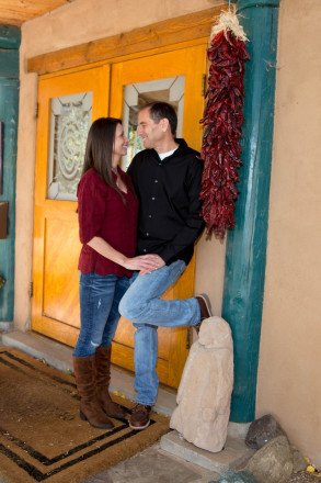 Engagement shoot in jeans with red chiles ristra