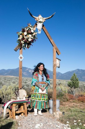 A member of Taos Pueblo officiated the outdoor September wedding ceremony
