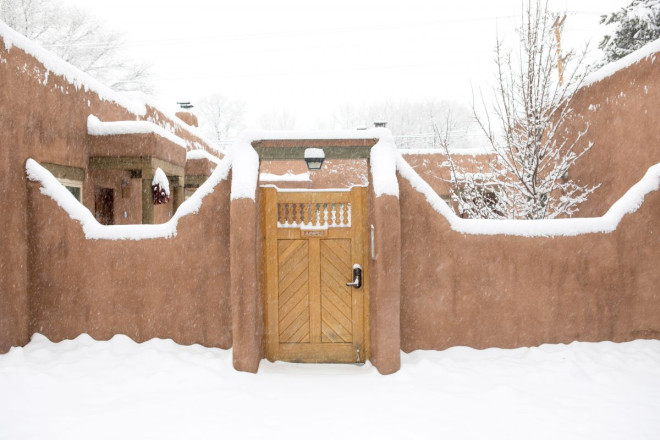 Wintertime view of condo during snowstorm near Taos Plaza