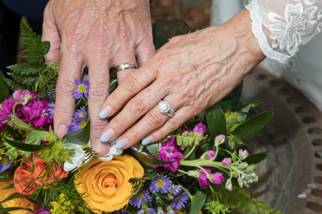 Beautiful professional bouquet showcasing Taos wedding rings