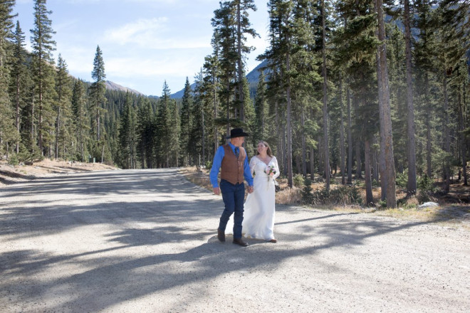 On top of the world with bride and groom at Taos Ski Valley