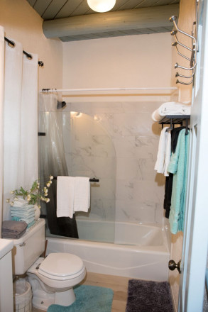 Wide angel photography captures traditional viga ceilings in condo in Taos, NM