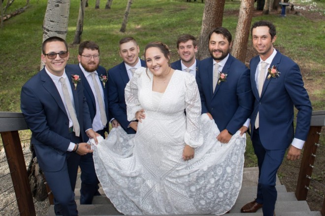 The groomsmen did a first-look  with the bride and they all approved!