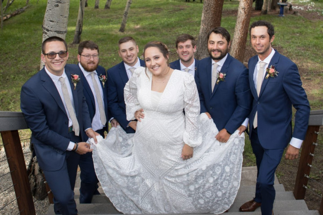 The groomsmen did a first-look with the bride and they all approved!