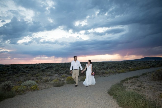 After a five minute walk, Erin and Cory were married with Three-Peaks looking on in the stormy background