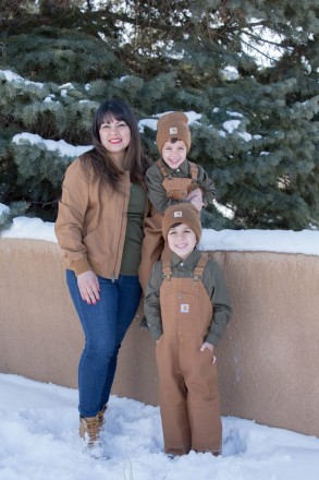 Family photo with young boys and mom in Carhartt outfits