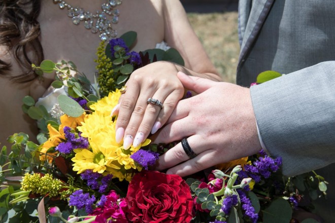 Wedding bouquet, wedding jewelry, wedding manicure, and wedding rings