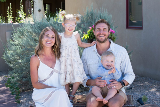 Taos family portraits with young children in front of sagebrush