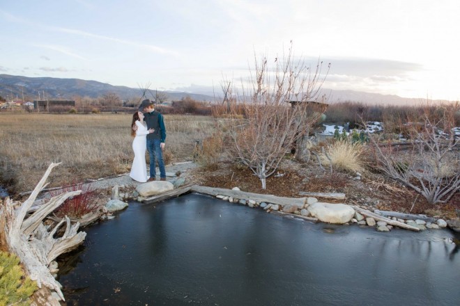 Frozen pond at wintertime Taos wedding