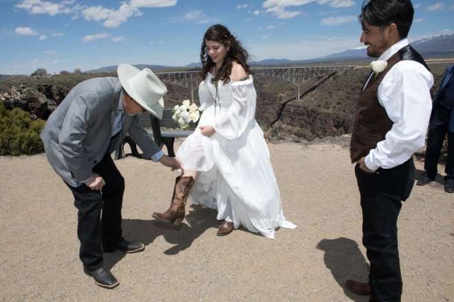 Mackenzie's soon-to-be father-in-law puts a penny in her shoe in the traditional spirit of good luck