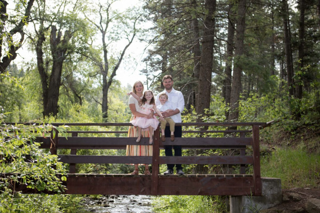 Family photographs on a bridge in Carson National Forest by Taos