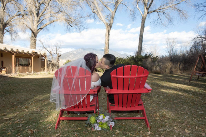 Maya and Robert in front of the beautiful views at Hacienda del Sol bed and breakfast.