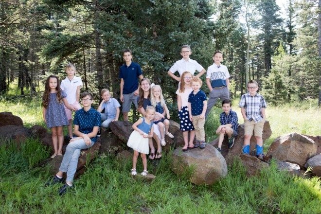 A photo with all of the cousins at family reunion in Angel Fire in June