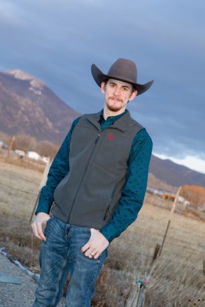 Taos groom in turquoise and cowboy hat
