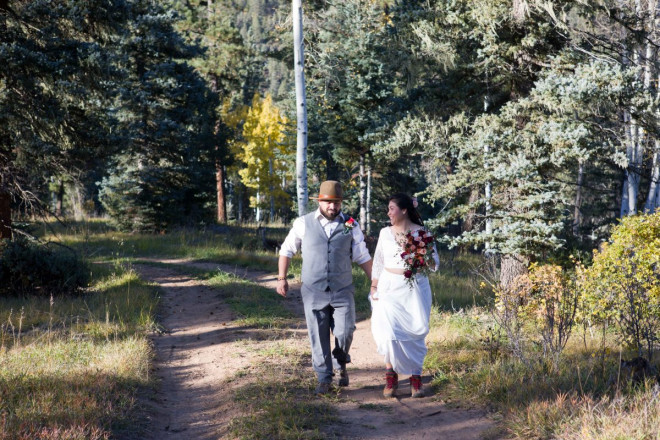 After the wedding ceremony Edwardo and Sarah walk hand in hand