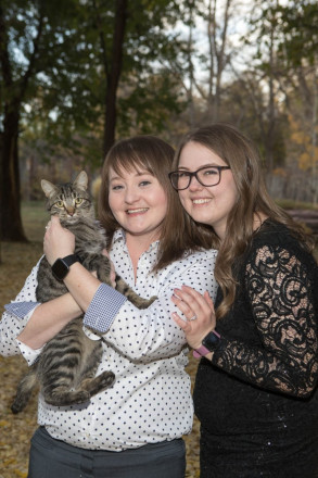 Leah and Kasey and local kitten vagabond at Adobe Pines Inn