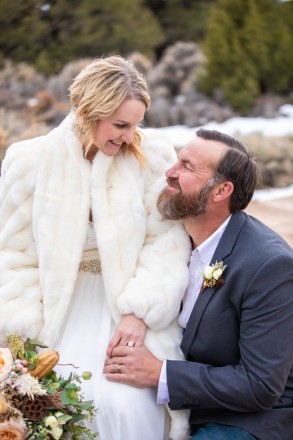 Nathan and Linsey smile after their elopement in Questa NM