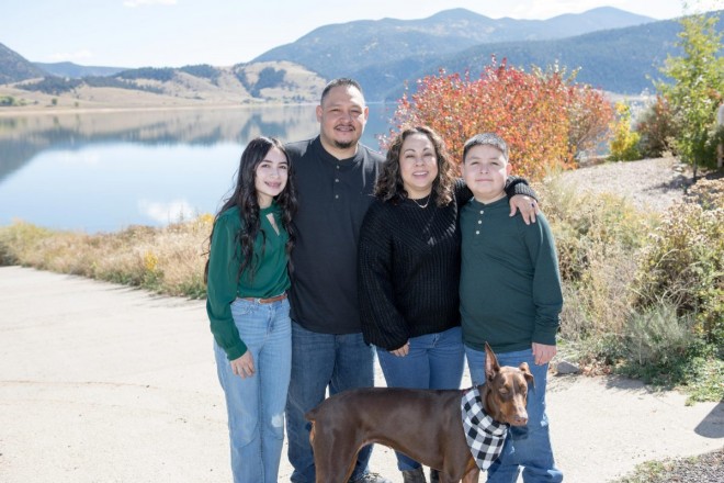 Family + dog with mountains at Eagle Nest Lake