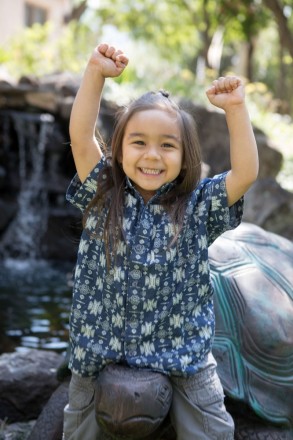 Three-year-old portrait with turtle art and pond backgrounds in Arroyo Seco