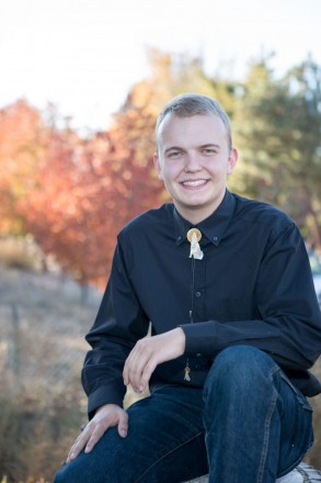 High school senior portraits with autumn foliage in The Bosque