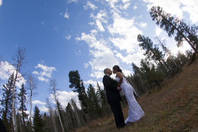 Chisato and Matthew share a moment with the trees on their wedding day
