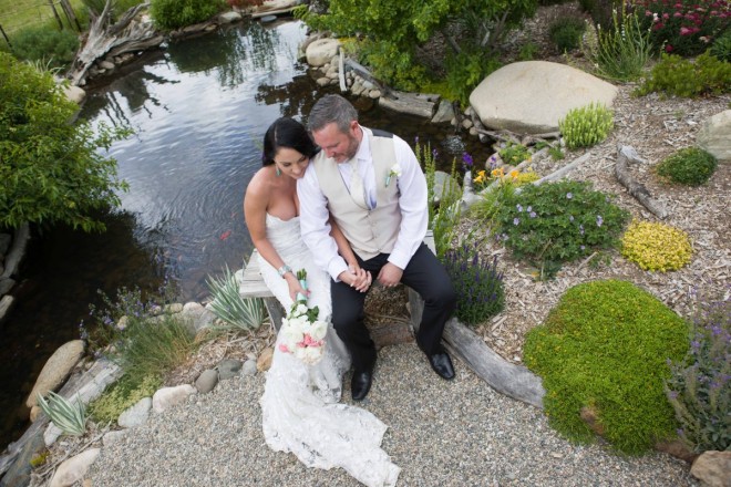 Allyssa and Glenn share a moment with the goldfish during their evening elopement