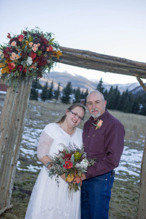 Celeste and Joseph were married in Red River with mountain views