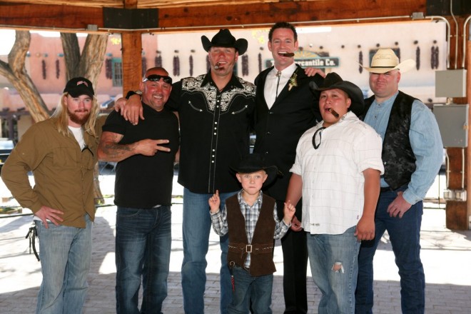 The groomsmen with the groom and ring bearer in Taos NM plaza