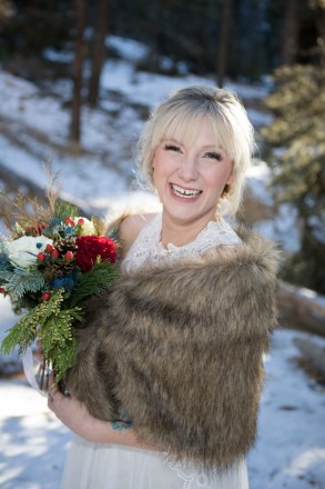 Amberly smiles after her outdoor December wedding in Red River, NM