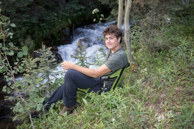 William, an avid camper and hiker, brought his camping chair to use in his senior pictures taken at Taos Ski Valley