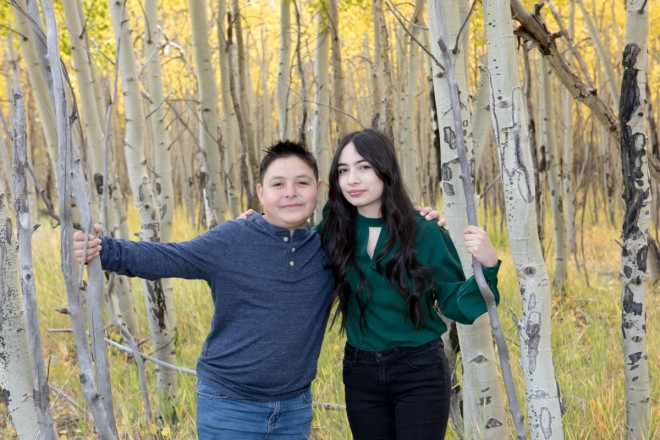 Sister and brother pictures with a million golden aspens in Angel Fire, NM
