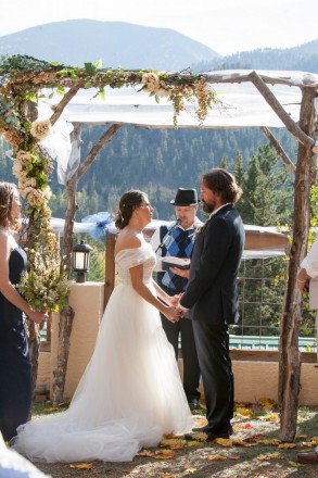 Jewish wedding in October in Red River under chuppah