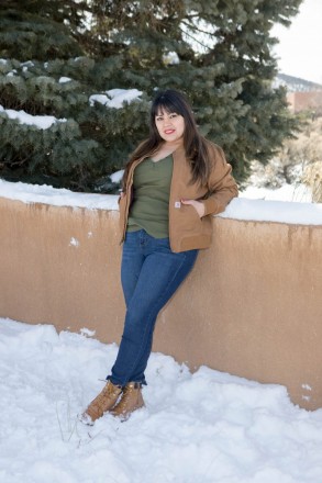 Family photos of Taos mom in jeans, by herself