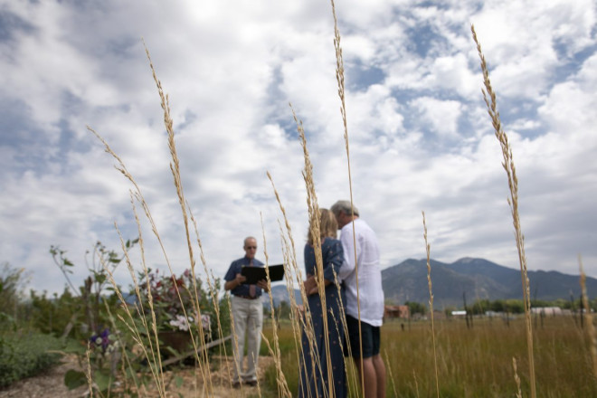 The beauty of nature in Taos surrounds us during this outdoor wedding ceremony