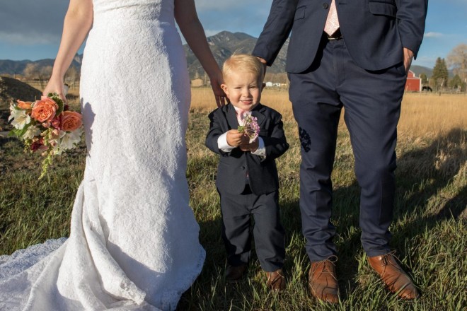 Ring bearer and son of bride and groom, loved flowers!