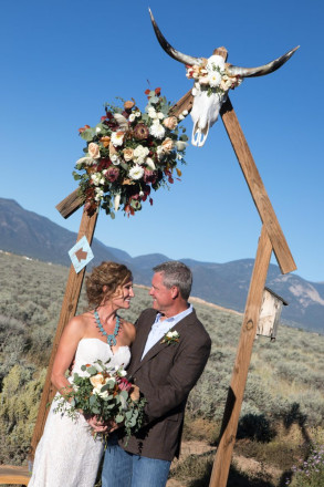 Contemporary shot of Chasity and Bill after their mesa wedding in Taos