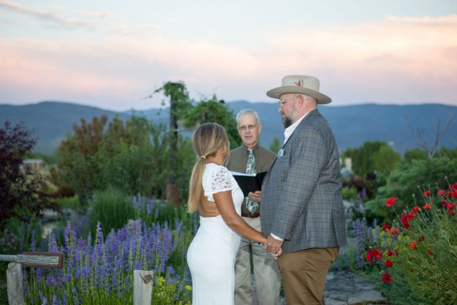 Dan Jones officiates a July wedding ceremony in SpiriTaos garden in Taos