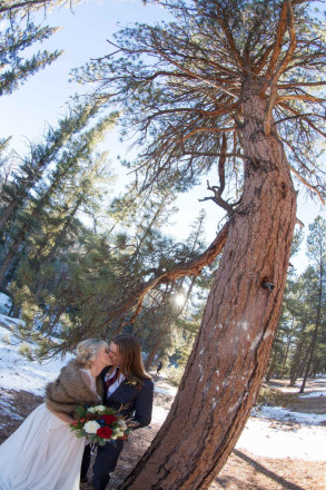 Love is a bride and a groom on a winter day in Red River, NM