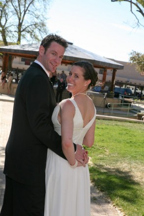Bride and groom smile after their gazebo wedding in Taos NM